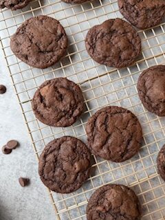 Chocolate Chunk cookies on a wire rack