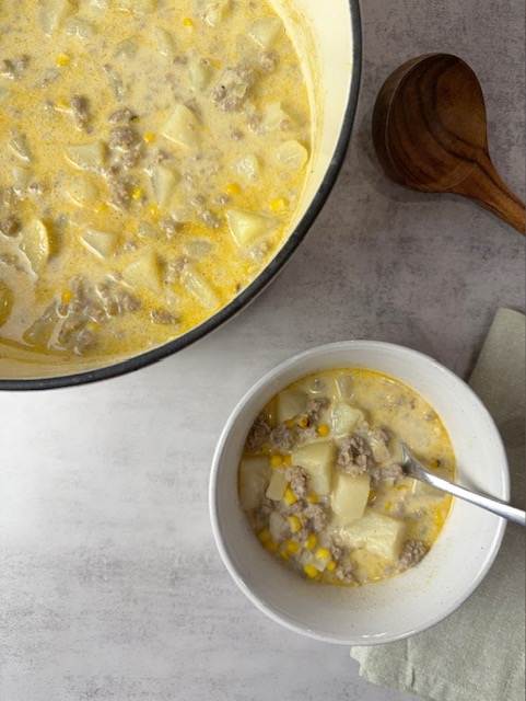 Spoon in bowl of chowder