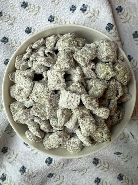 Dubai Chocolate Puppy Chow on floral towel
