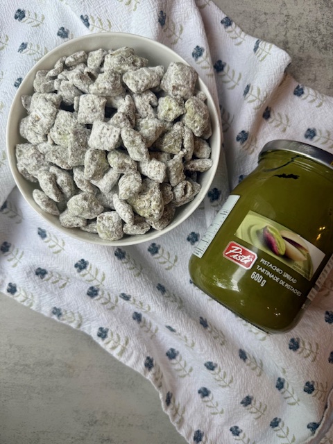 Dubai Chocolate Puppy Chow with jar of pistachio cream