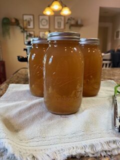 Quart jars filled with chicken bone broth