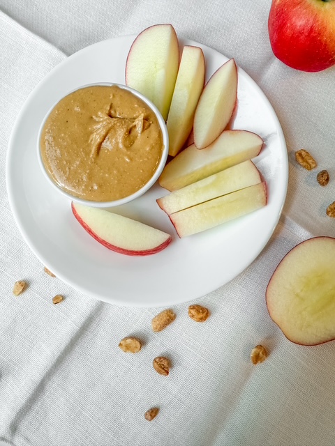 Sliced apples and peanut butter