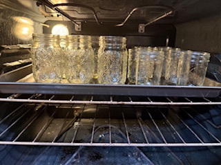 Mason Jars on baking sheet in oven