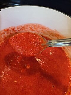 Strawberry Puree and Sure Jell in Dutch Oven