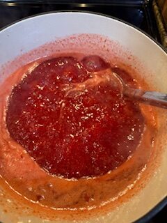Strawberry Jam Boiling in Dutch Oven