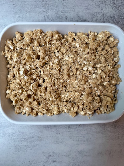 Crumble mixture on top of cherries