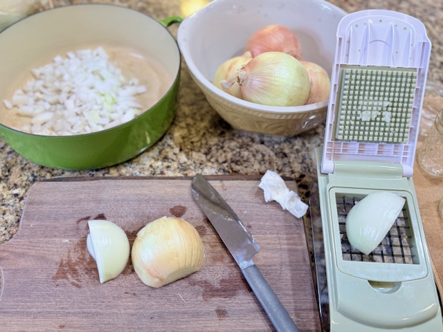 cutting onions on wood cutting board