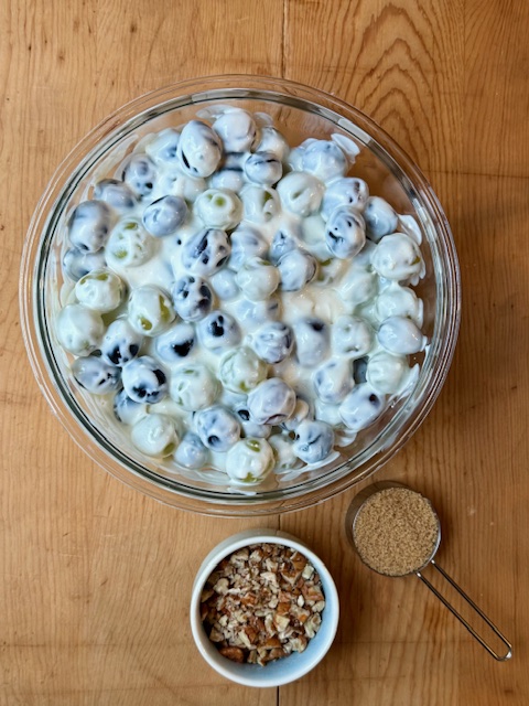 Grapes covered in cream cheese mixture