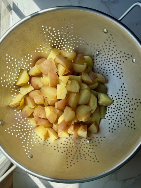 Strained Potato in colander
