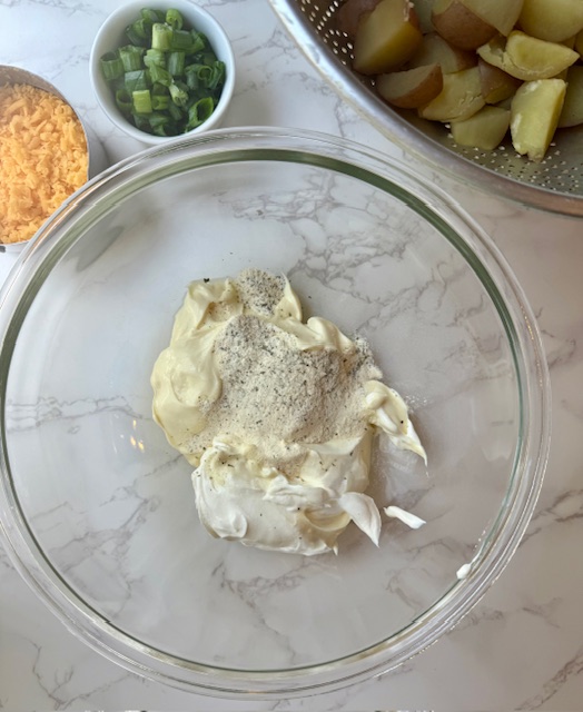 Dressing ingredients in glass bowl
